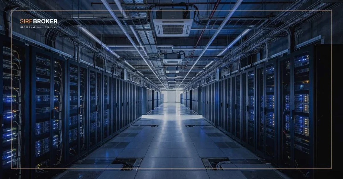 Rows of server racks in an Indian hyperscale data centre facility glowing blue in a modern industrial space