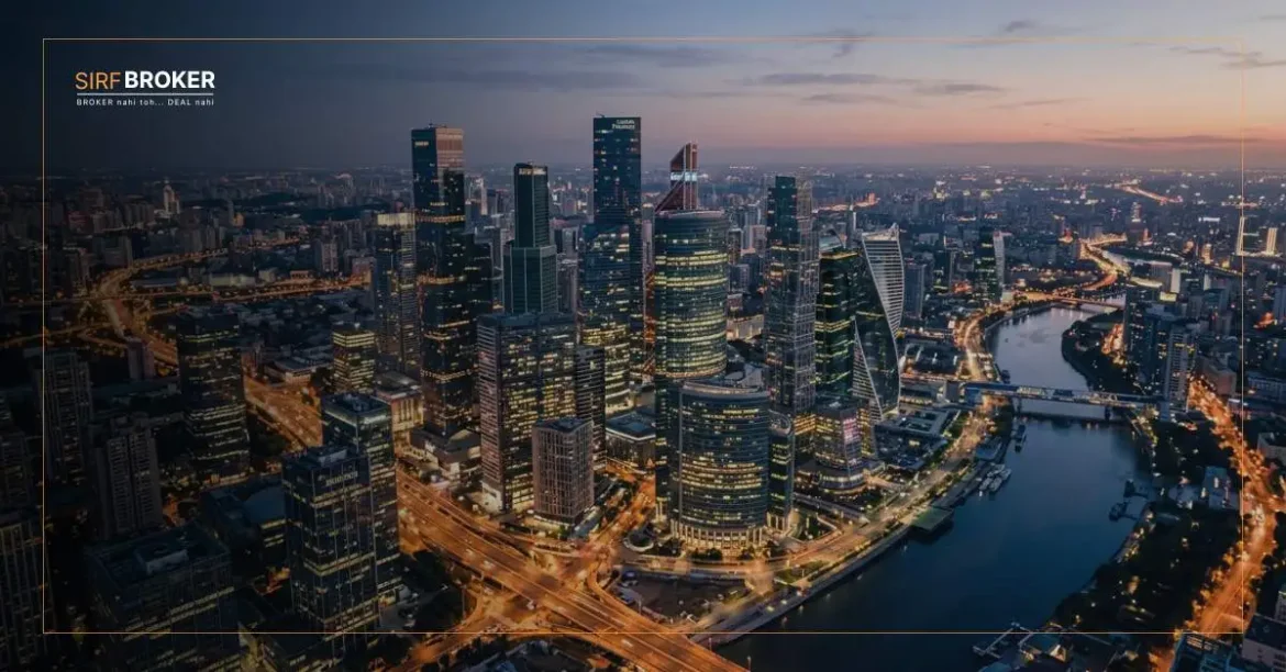 Global commercial real estate investment recovery 2026 — aerial view of financial district at dusk